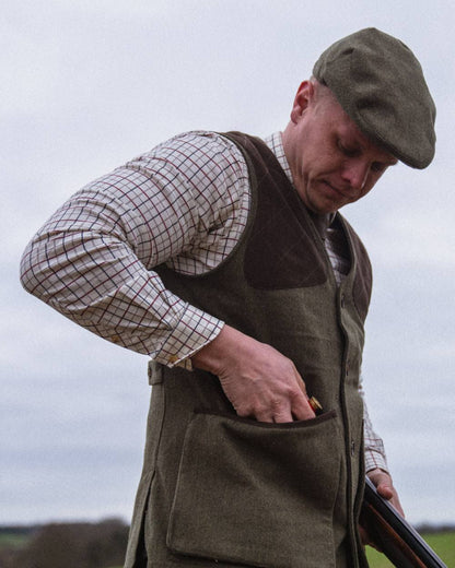 Moss Green Coloured Seeland Hillside Waistcoat on outdoor background #colour_moss-green