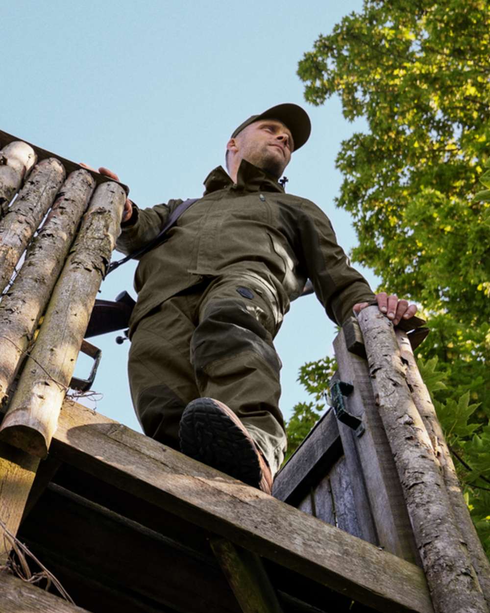 Pine Green Coloured Seeland Key-Point Active II Jacket on forest background #colour_pine-green