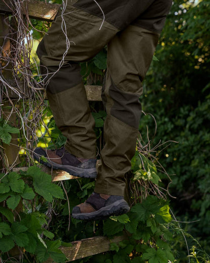 Pine Green Coloured Seeland Key-Point Active II Trousers on outdoor background #colour_pine-green