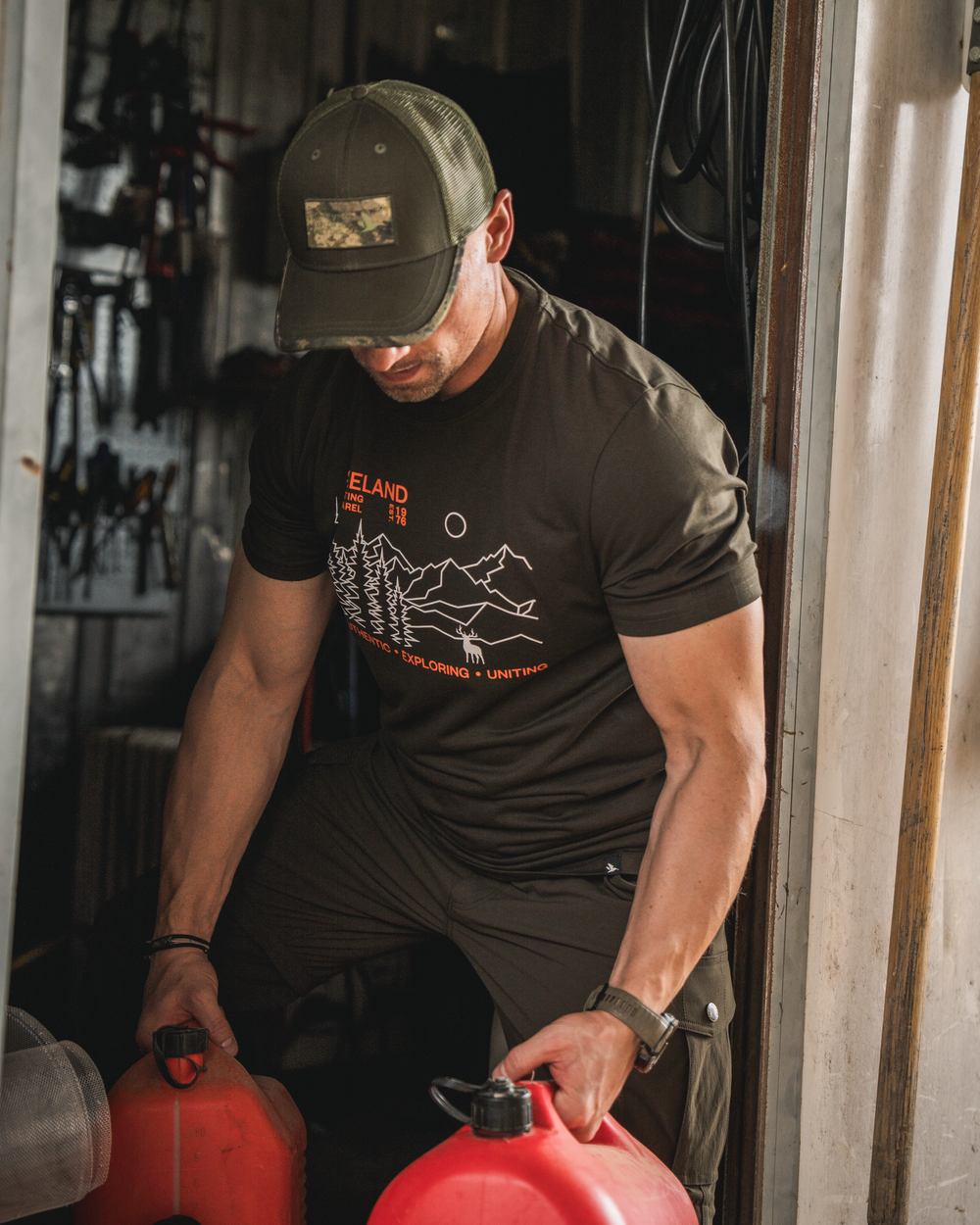 Pine Green Coloured Seeland Landscape T-Shirt on outdoor background #colour_pine-green