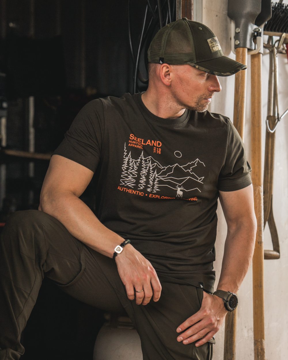 Pine Green Coloured Seeland Landscape T-Shirt on outdoor background #colour_pine-green