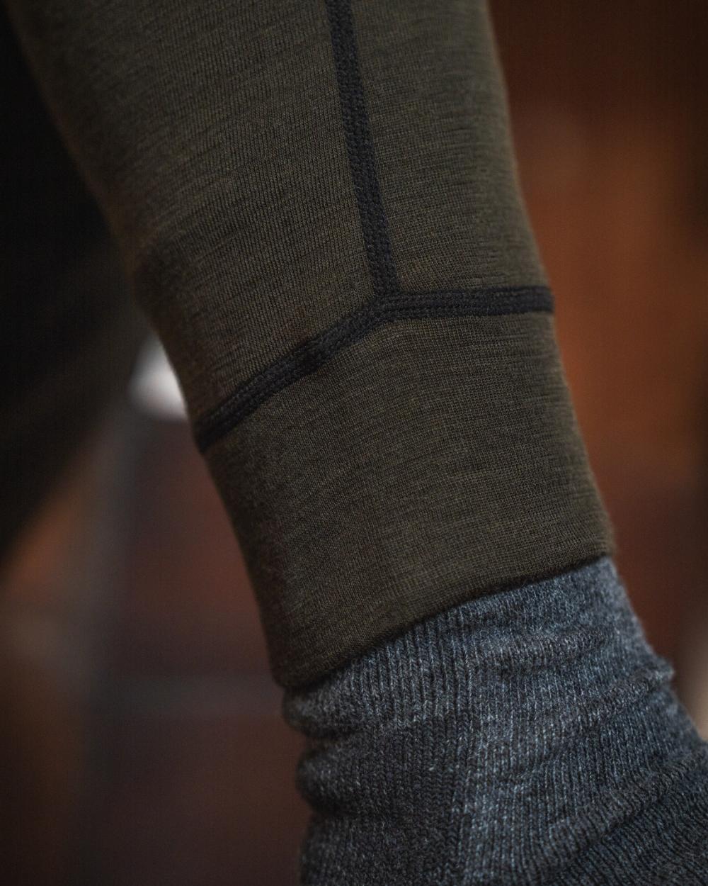 Pine Green Coloured Seeland Mens Apex One Hundred Long Johns on outdoor background #colour_pine-green