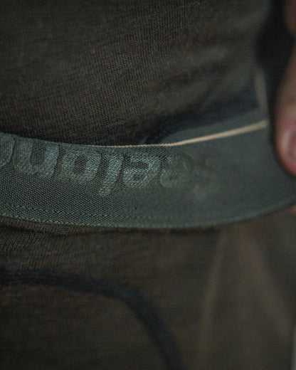 Pine Green Coloured Seeland Mens Apex One Hundred Long Johns on outdoor background #colour_pine-green