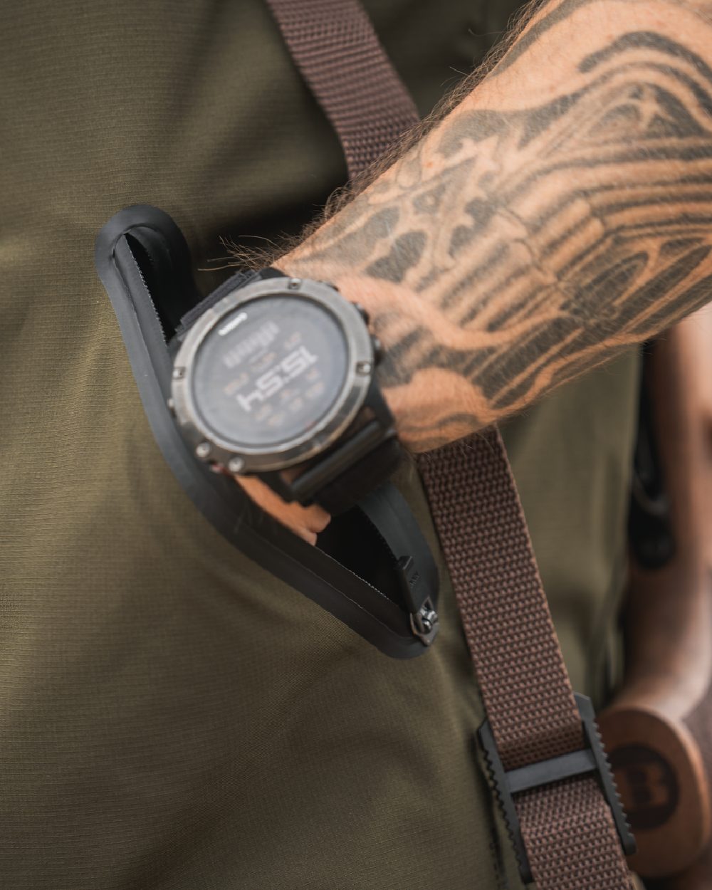 Pine Green Coloured Seeland Mens Chaser Aero Waistcoat on mountain background #colour_pine-green