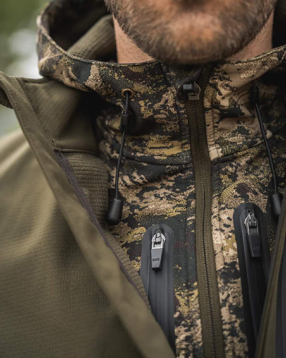 Pine Green Coloured Seeland Mens Chaser Aero Waistcoat on mountain background #colour_pine-green