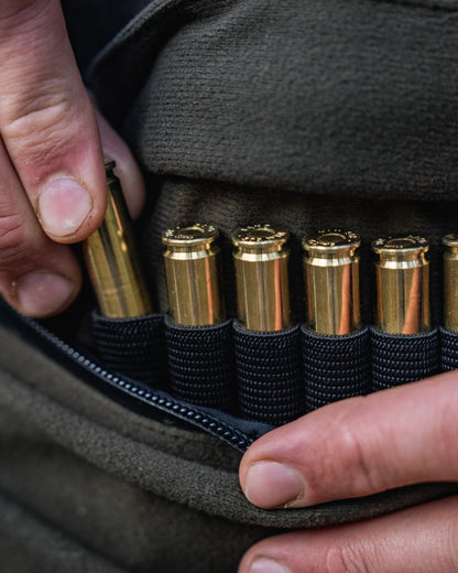 Pine Green coloured Seeland Mens Chaser BGH Smock on forest background #colour_pine-green