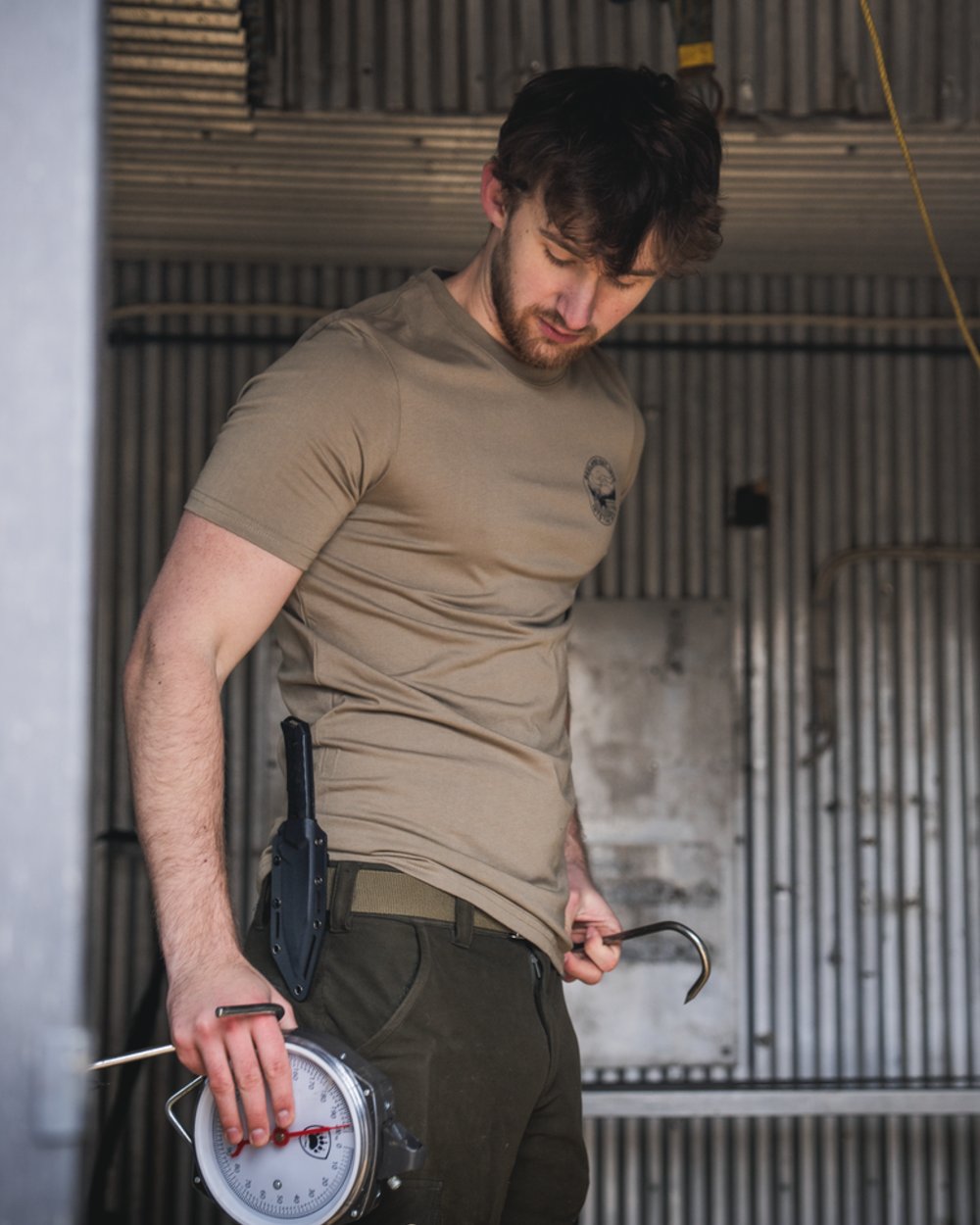 Covert Green coloured Seeland Mens Hunting Landscape T-Shirt on factory background #colour_covert-green