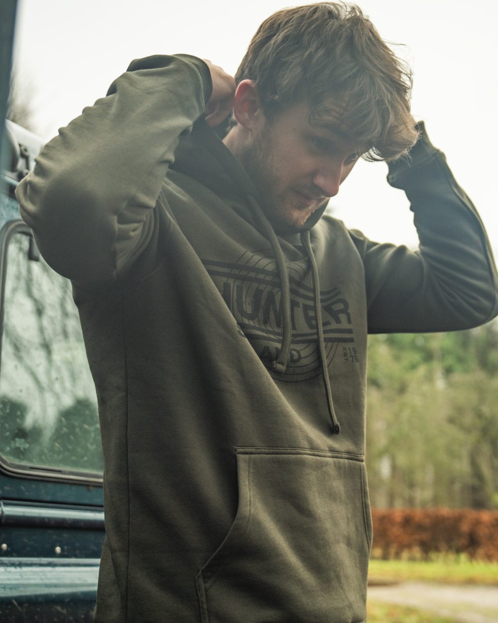 Pine Green Coloured Seeland Mens On Point Hoodie on outdoor background #colour_pine-green
