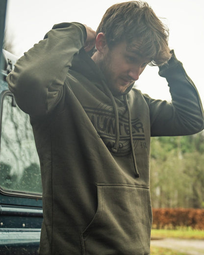 Pine Green Coloured Seeland Mens On Point Hoodie on outdoor background #colour_pine-green