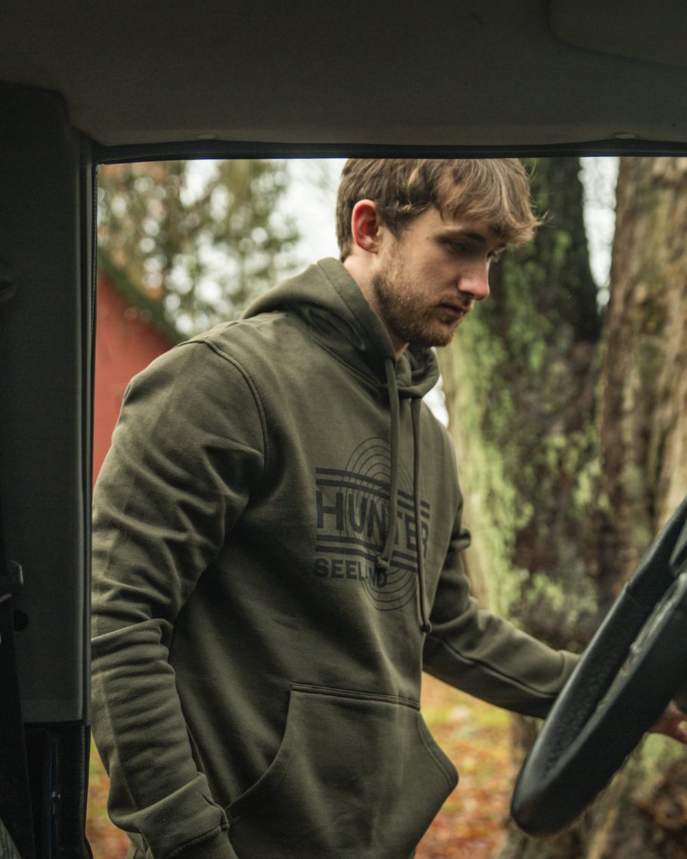 Pine Green Coloured Seeland Mens On Point Hoodie on outdoor background #colour_pine-green