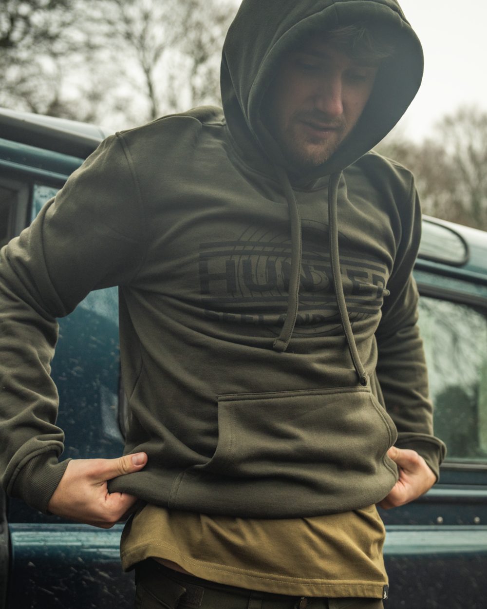 Pine Green Coloured Seeland Mens On Point Hoodie on outdoor background #colour_pine-green