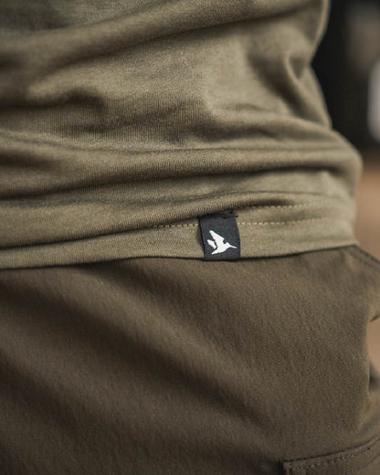 Grape Leaf Coloured Seeland Mens Packing T-Shirt on blurry background #colour_grape-leaf