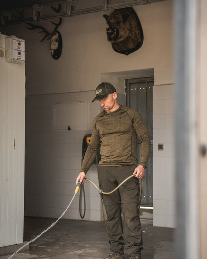 Military Olive Melange Coloured Seeland Peak T-shirt on Indoor Background
#colour_military-olive-melange