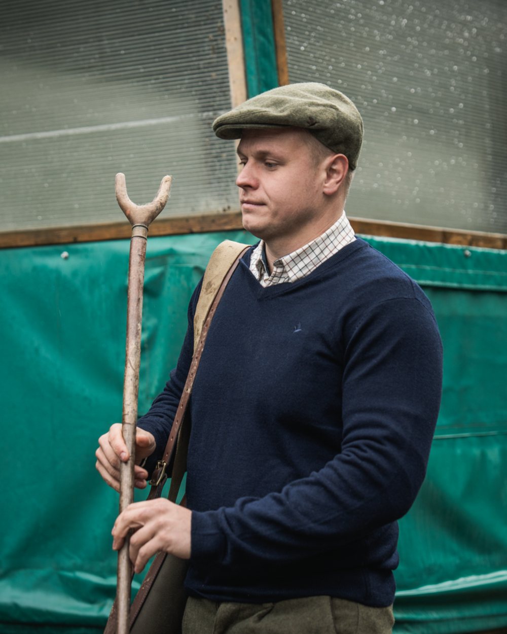 Dark Sapphire Coloured Seeland Mens Pine V-Neck Pullover on outdoor background #colour_dark-sapphire