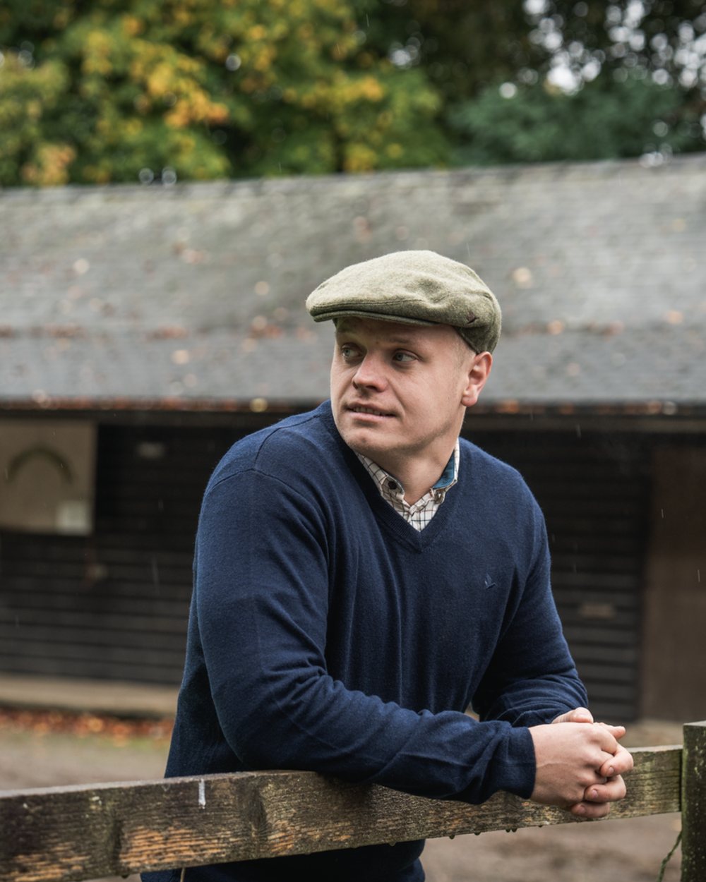 Dark Sapphire Coloured Seeland Mens Pine V-Neck Pullover on outdoor background #colour_dark-sapphire