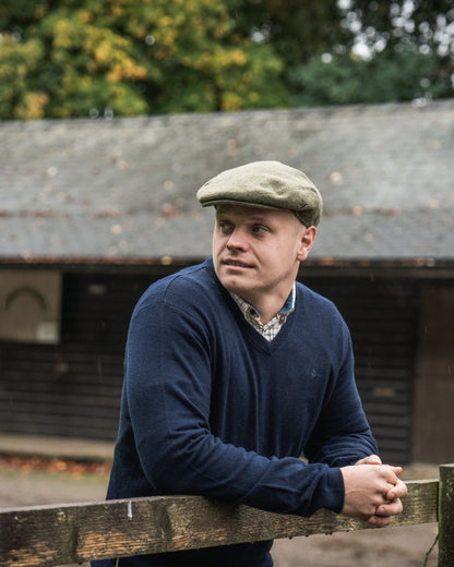 Dark Sapphire Coloured Seeland Mens Pine V-Neck Pullover on outdoor background #colour_dark-sapphire