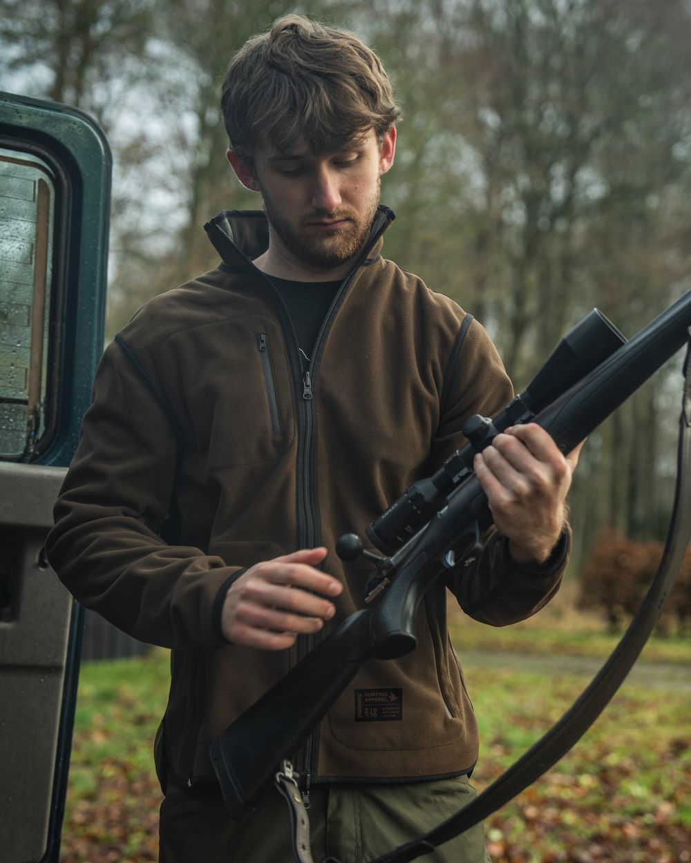Grizzly Brown Demitasse Brown Coloured Seeland Mens Rogue Solid Reversible Fleece Jacket on forest background #colour_grizzly-brown-demitasse-brown