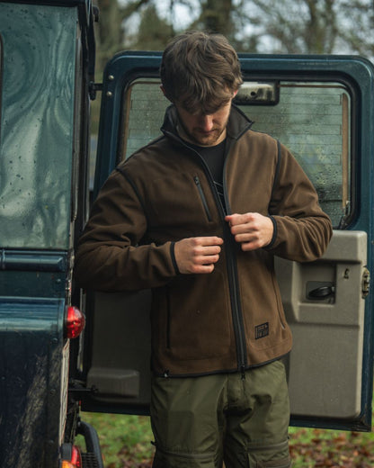 Grizzly Brown Demitasse Brown Coloured Seeland Mens Rogue Solid Reversible Fleece Jacket on forest background #colour_grizzly-brown-demitasse-brown