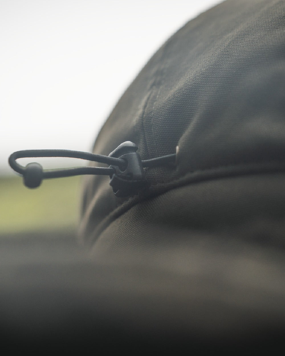 Pine Green coloured Seeland Mens Teddy Fold Down Cap on fog background #colour_pine-green