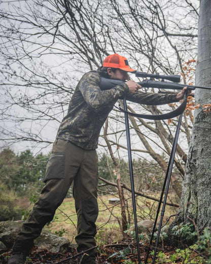 InVIS MPC Green Coloured Seeland Mens Tidal Camo Fleece Jacket on forest background #colour_invis-mpc-green