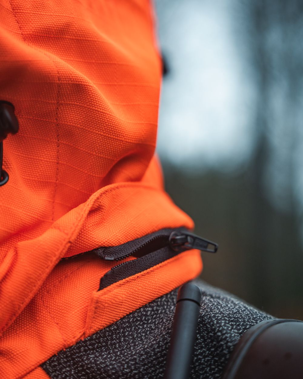 Orange Blaze Coloured Seeland Mens Venture Serac Jacket on outdoor background #colour_orange-blaze