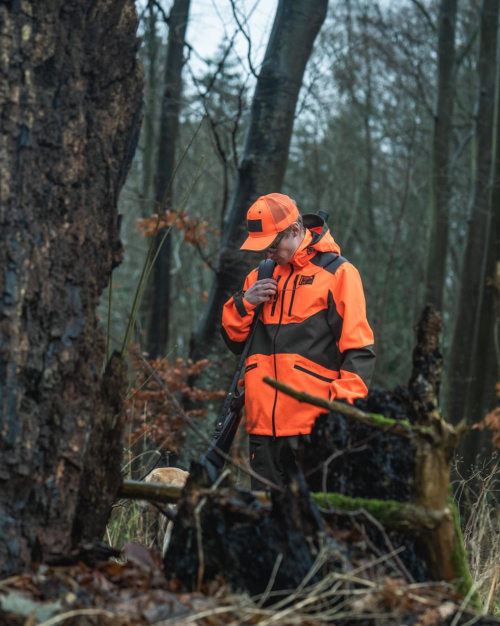 Orange Blaze Coloured Seeland Mens Venture Serac Jacket on outdoor background #colour_orange-blaze