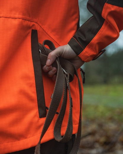 Orange Blaze Coloured Seeland Mens Venture Serac Jacket on outdoor background #colour_orange-blaze