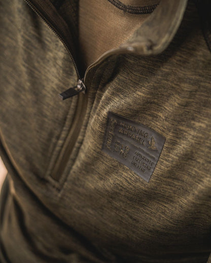 Pine Green Melange Coloured Seeland Peak Half Zip on outdoor background #colour_pine-green-melange