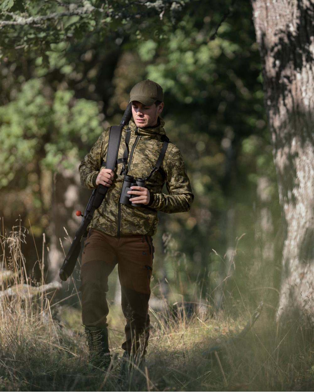 InVis Green Coloured Seeland Power Camo Fleece Jacket on forest background #colour_invis-green