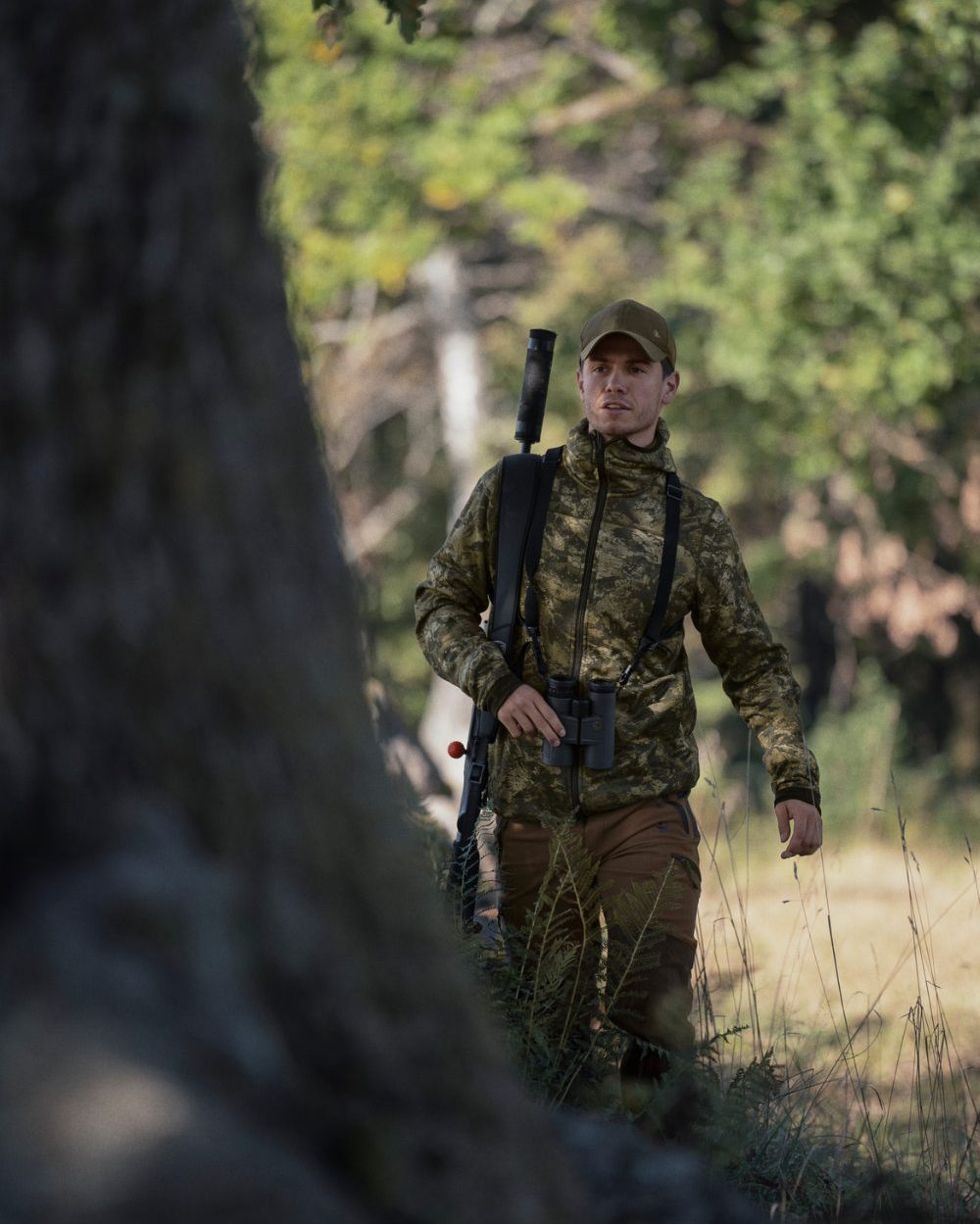 InVis Green Coloured Seeland Power Camo Fleece Jacket on forest background #colour_invis-green