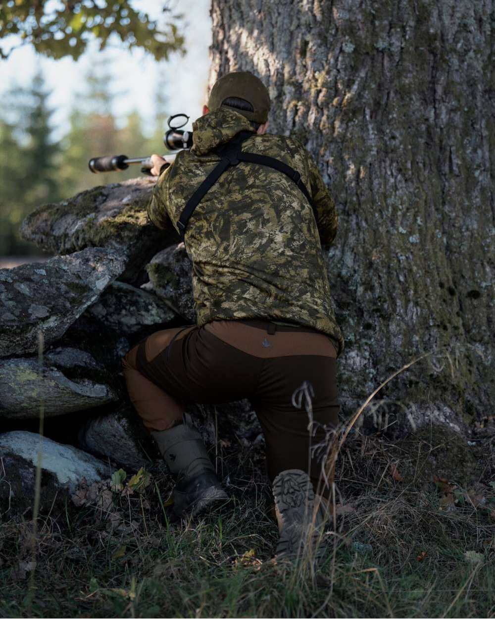 InVis Green Coloured Seeland Power Camo Fleece Jacket on forest background #colour_invis-green