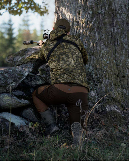 InVis Green Coloured Seeland Power Camo Fleece Jacket on forest background #colour_invis-green