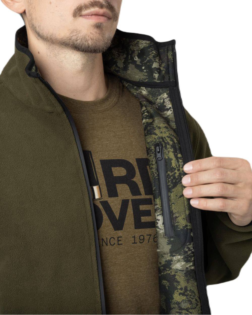 Light Pine InVis Green Coloured Seeland Rogue Reversible Fleece Jacket on white background #colour_light-pine-invis-green
