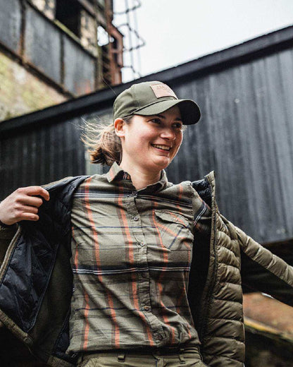 Grape Leaf Terracotta Check Coloured Seeland Skye Flannel Shirt on outdoor background #colour_grape-leaf-terracotta-check