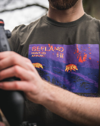 Pine Green Coloured Seeland Thermal T-Shirt on outdoor background #colour_pine-green