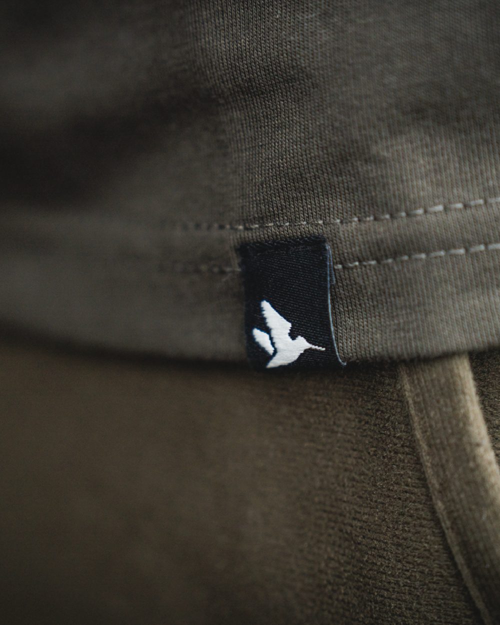 Pine Green Coloured Seeland Thermal T-Shirt on indoor background #colour_pine-green