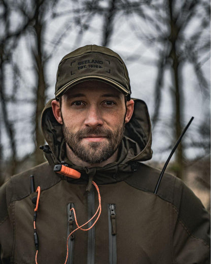 Light Pine Coloured Seeland Trax Cap on forest background #colour_light-pine