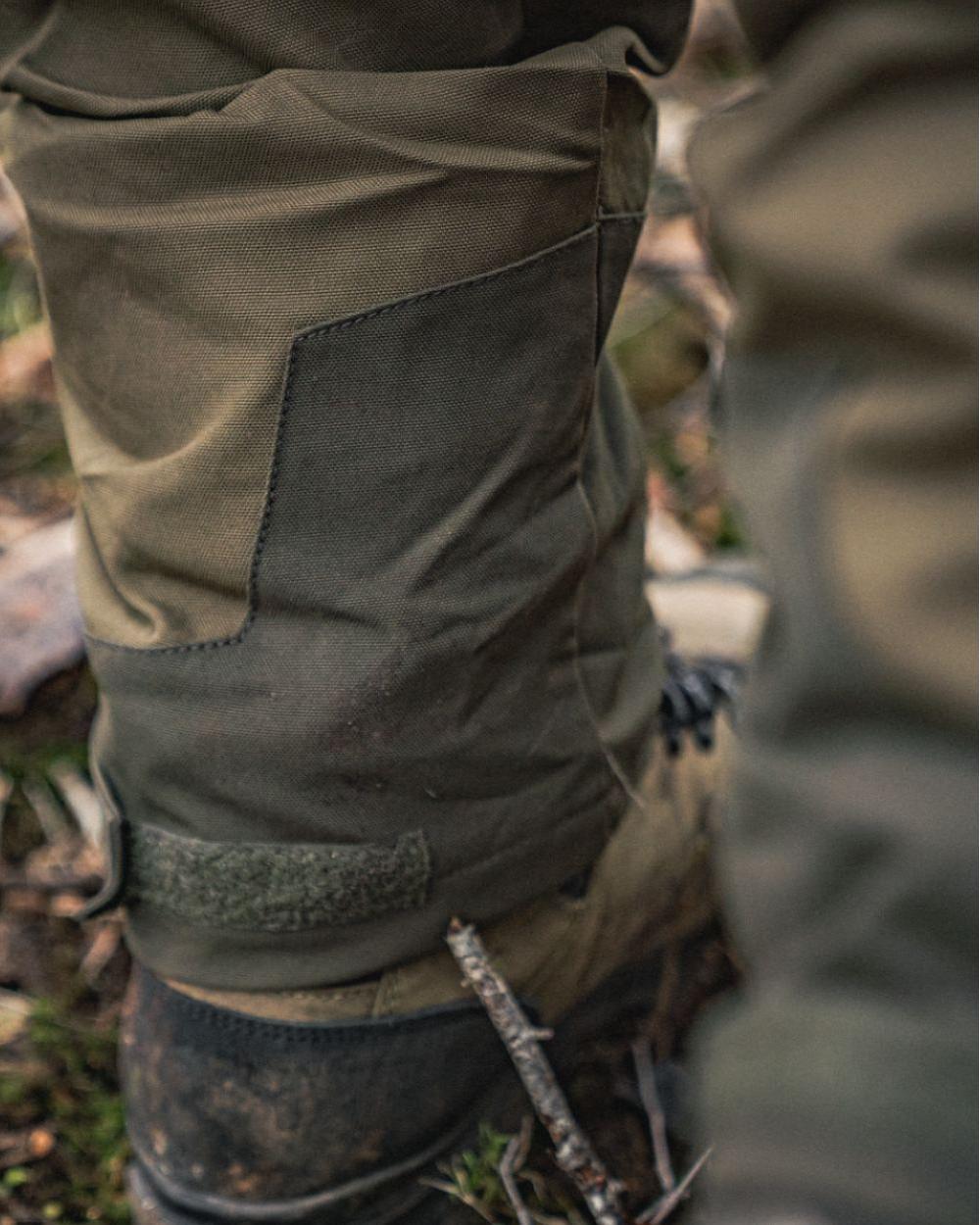 Light Pine Coloured Seeland Trax Trousers on outdoor background #colour_light-pine