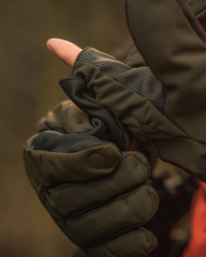 Pine Green coloured Seeland Trigger Fold-Back Gloves on forest background #colour_pine-green