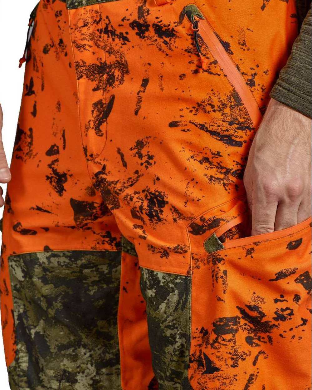 InVis Green InVis Orange Blaze Coloured Seeland Vantage Trousers on white background #colour_invis-green-invis-orange-blaze