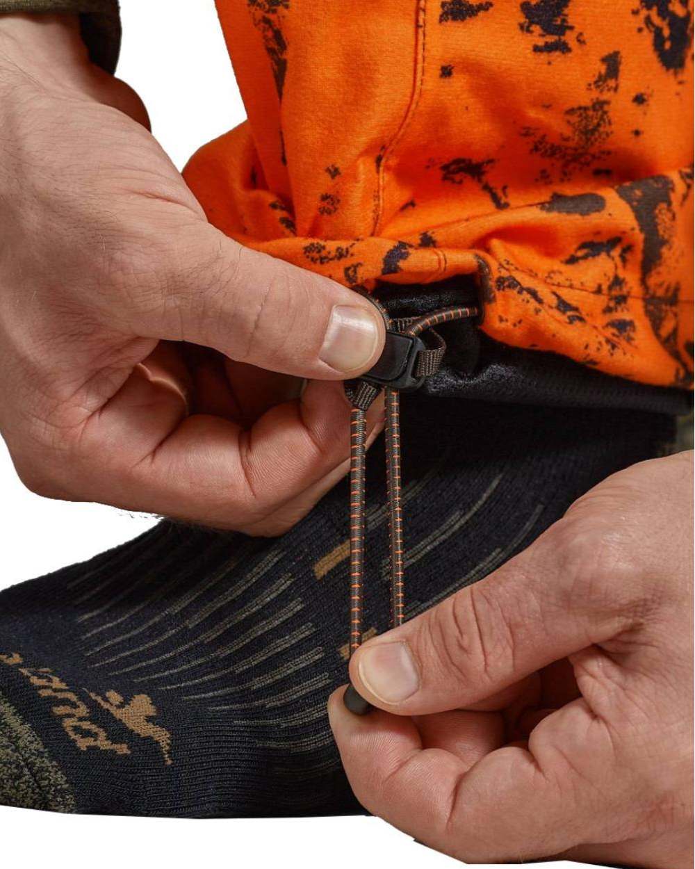 InVis Green InVis Orange Blaze Coloured Seeland Vantage Trousers on white background #colour_invis-green-invis-orange-blaze