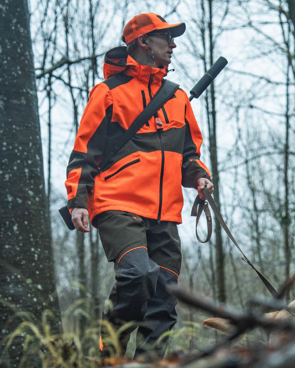 Orange Blaze coloured Seeland Venture Rover Cap on forest background #colour_orange-blaze
