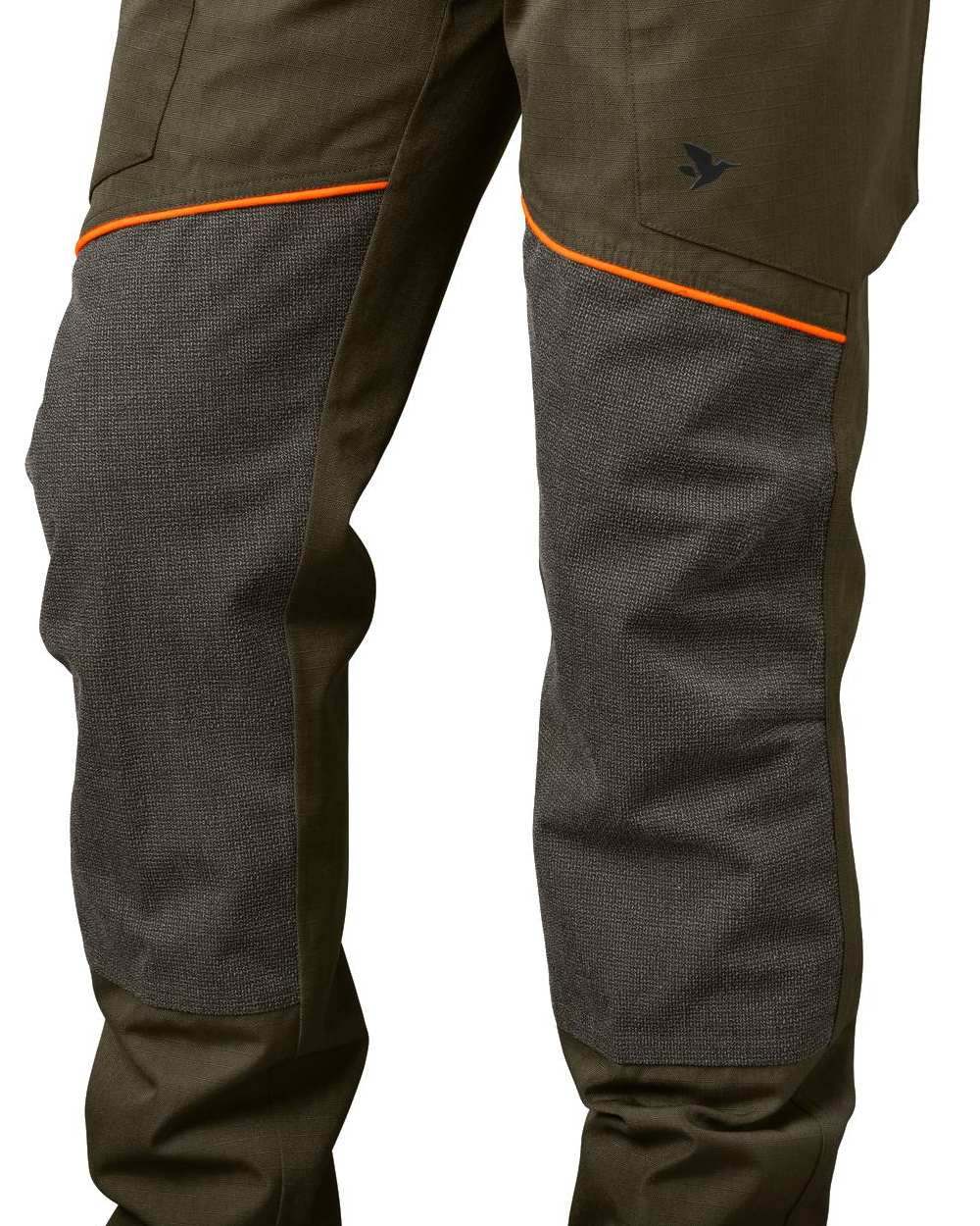 Pine Green Hi-Vis Orange Coloured Seeland Venture Trousers on white background #colour_pine-green-hi-vis-orange