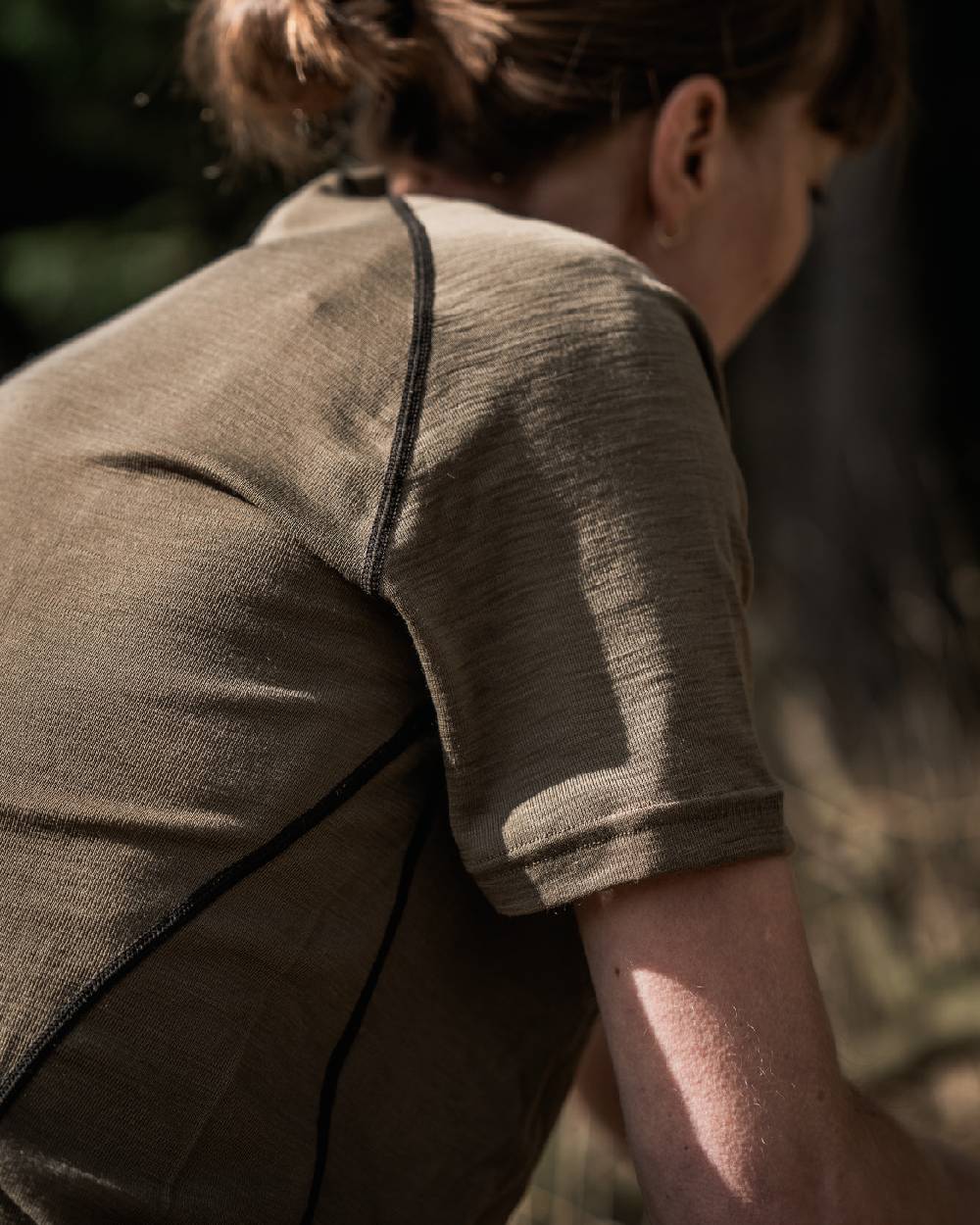 Covert Green Coloured Seeland Womens Apex Aia Merino T-shirt on outdoor background
#colour_covert-green