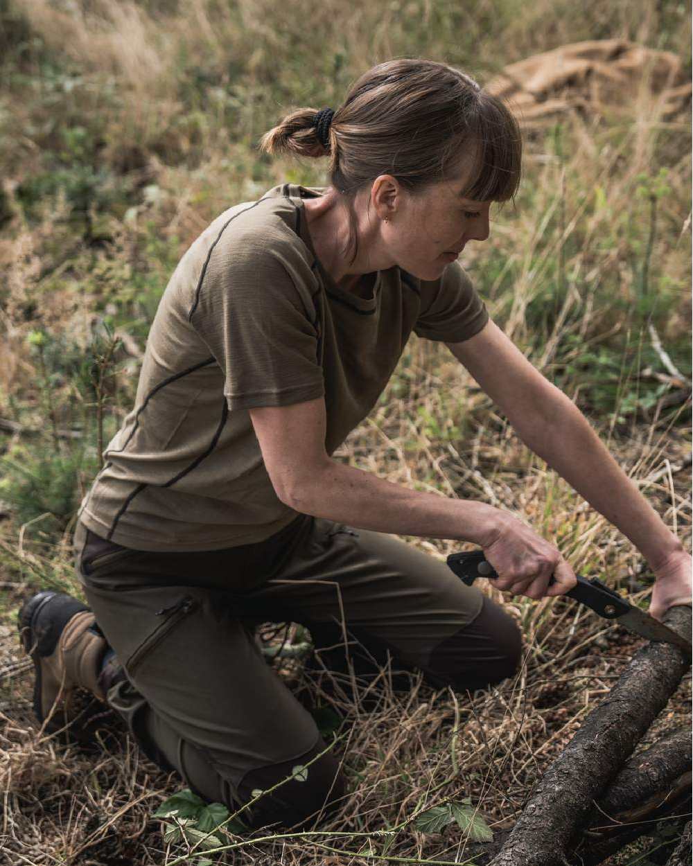 Covert Green Coloured Seeland Womens Apex Aia Merino T-shirt on outdoor background
#colour_covert-green