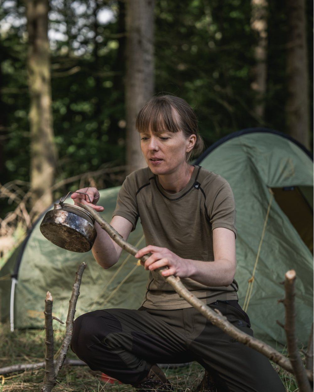 Covert Green Coloured Seeland Womens Apex Aia Merino T-shirt on outdoor background
#colour_covert-green