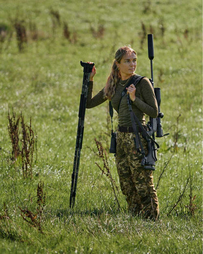 InVis MPC Green Coloured Seeland Womens Avail Camo Trousers on forest background #colour_invis-mpc-green