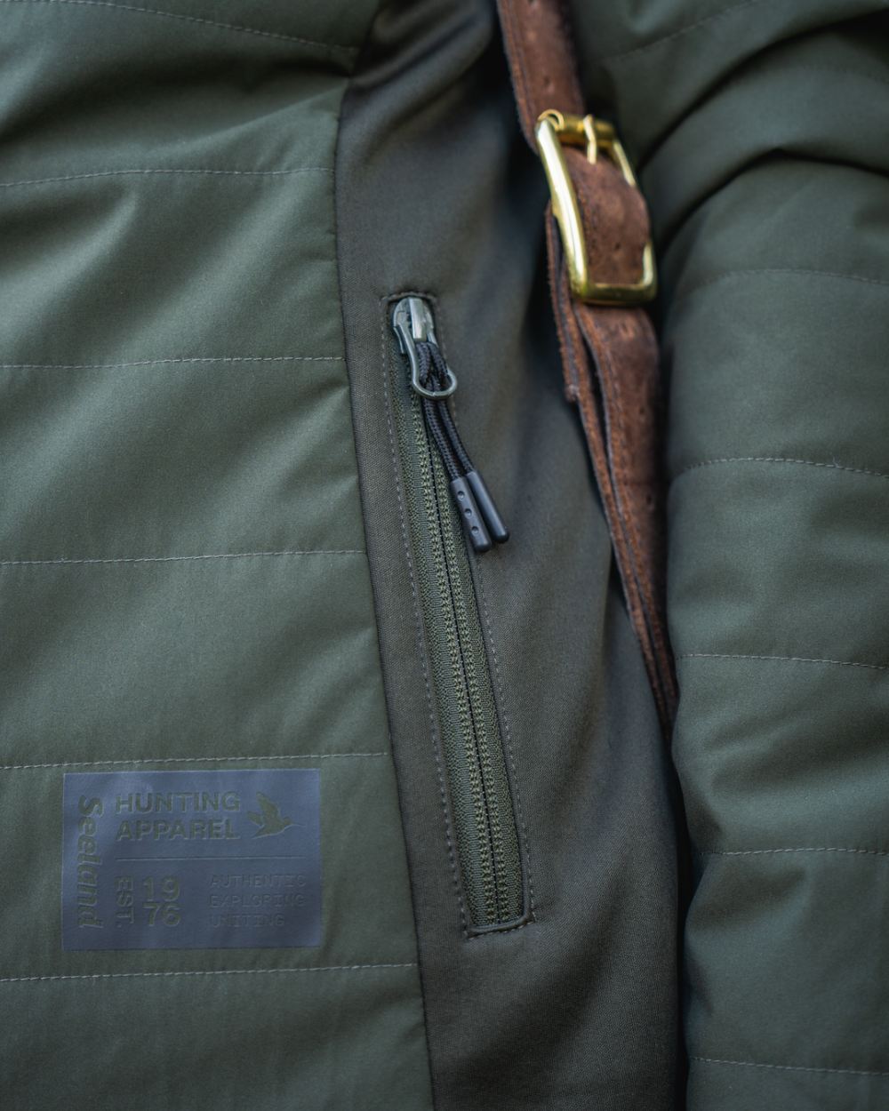 Pine Green Coloured Seeland Womens Celsius Aia Heat Jacket on outdoor background #colour_pine-green