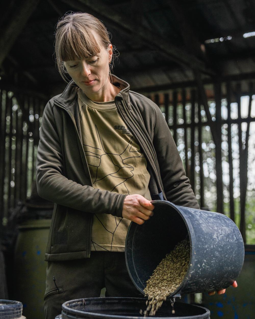 Military Olive Coloured Seeland Womens Deer On Line T-Shirt on outdoor background #colour_military-olive