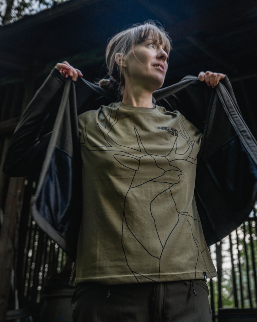 Military Olive Coloured Seeland Womens Deer On Line T-Shirt on outdoor background #colour_military-olive